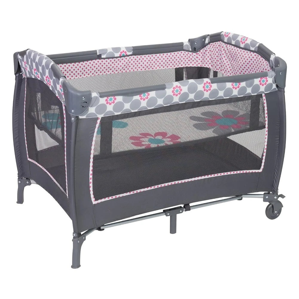 Lil' Snooze™ Deluxe II Nursery Center® Play yard, Daisy Dots Cozy napper with canopy and 2 plush toys