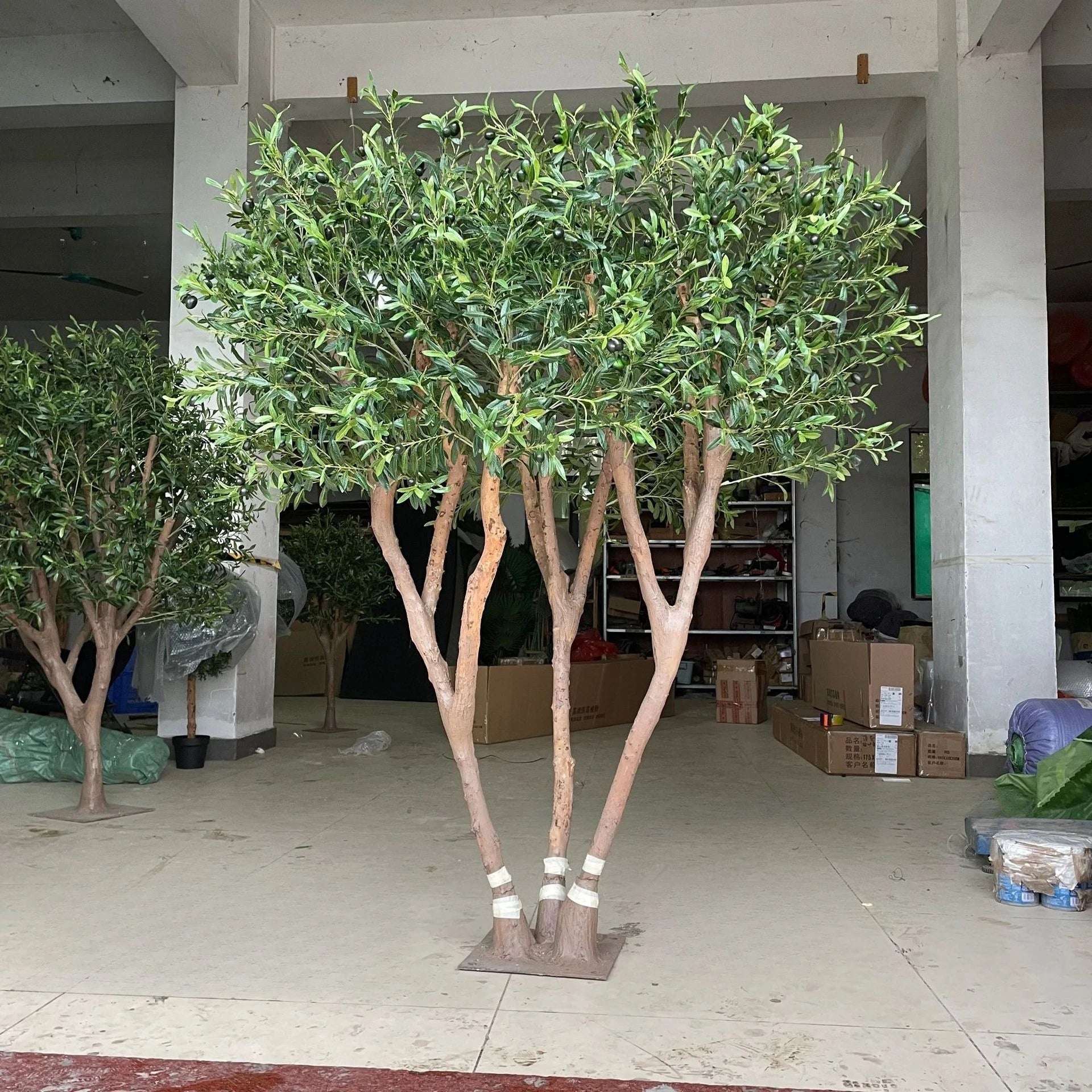 Simulated Olive Tree for Use Indoor or Outdoor; a Fake Green Plant used for decoration.