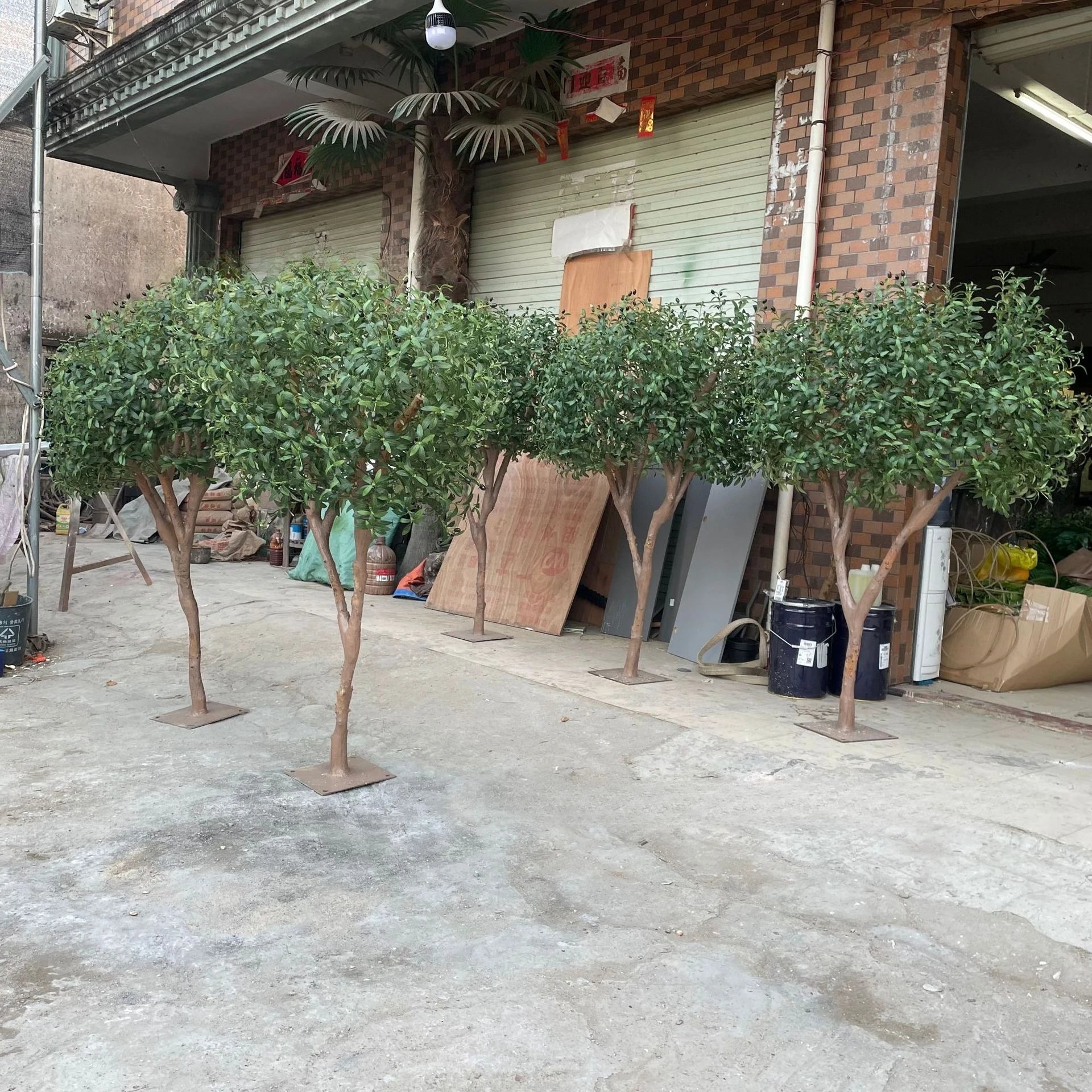 Simulated Olive Tree for Use Indoor or Outdoor; a Fake Green Plant used for decoration.