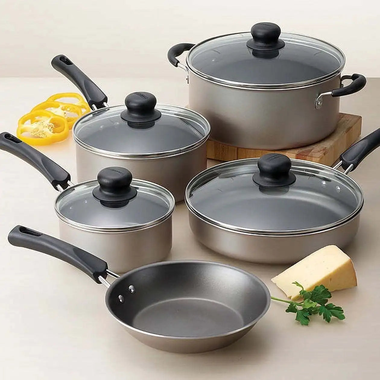 9-piece versatile non-stick cookware set, champagne in color. Lightweight but durable,