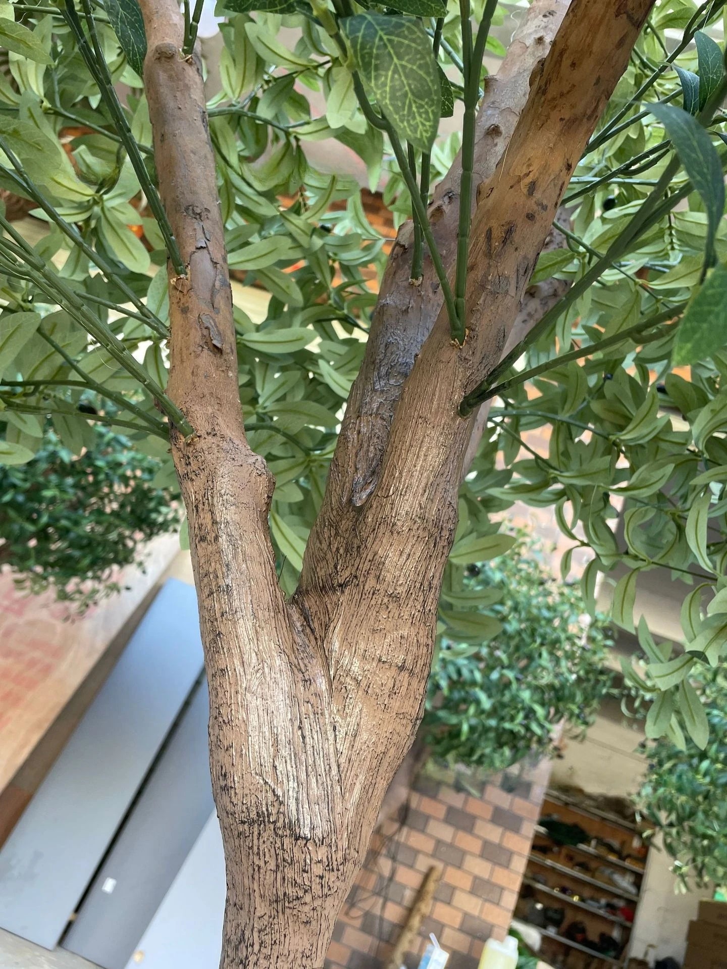 Simulated Olive Tree for Use Indoor or Outdoor; a Fake Green Plant used for decoration.