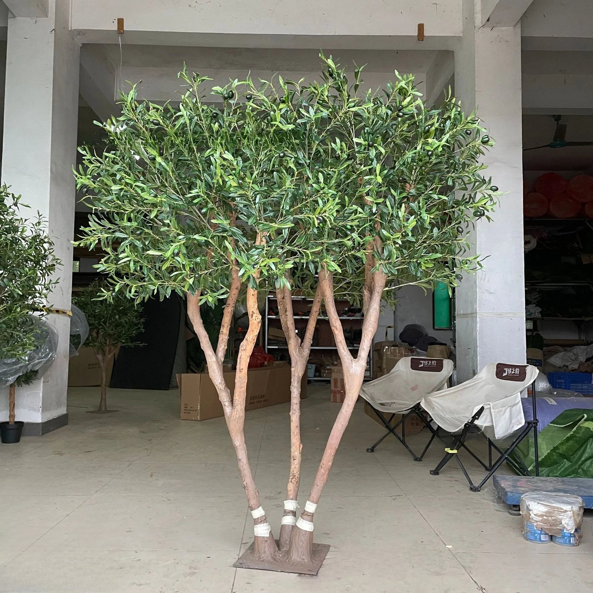 Simulated Olive Tree for Use Indoor or Outdoor; a Fake Green Plant used for decoration.