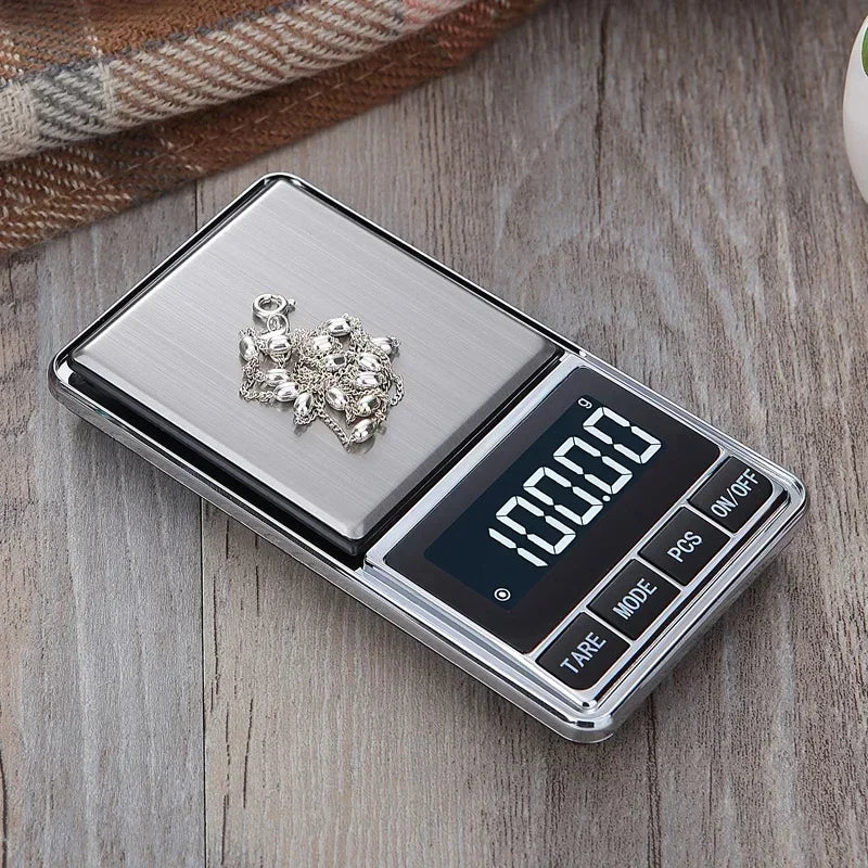 Mini Portable Electronic Gram Scale for Measuring jewelry or for Kitchen Use.