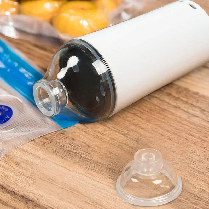 Reusable Electric Handheld Vacuum Sealer Pump with Zipper Bags for Food Storage or Sous Vide Bags.