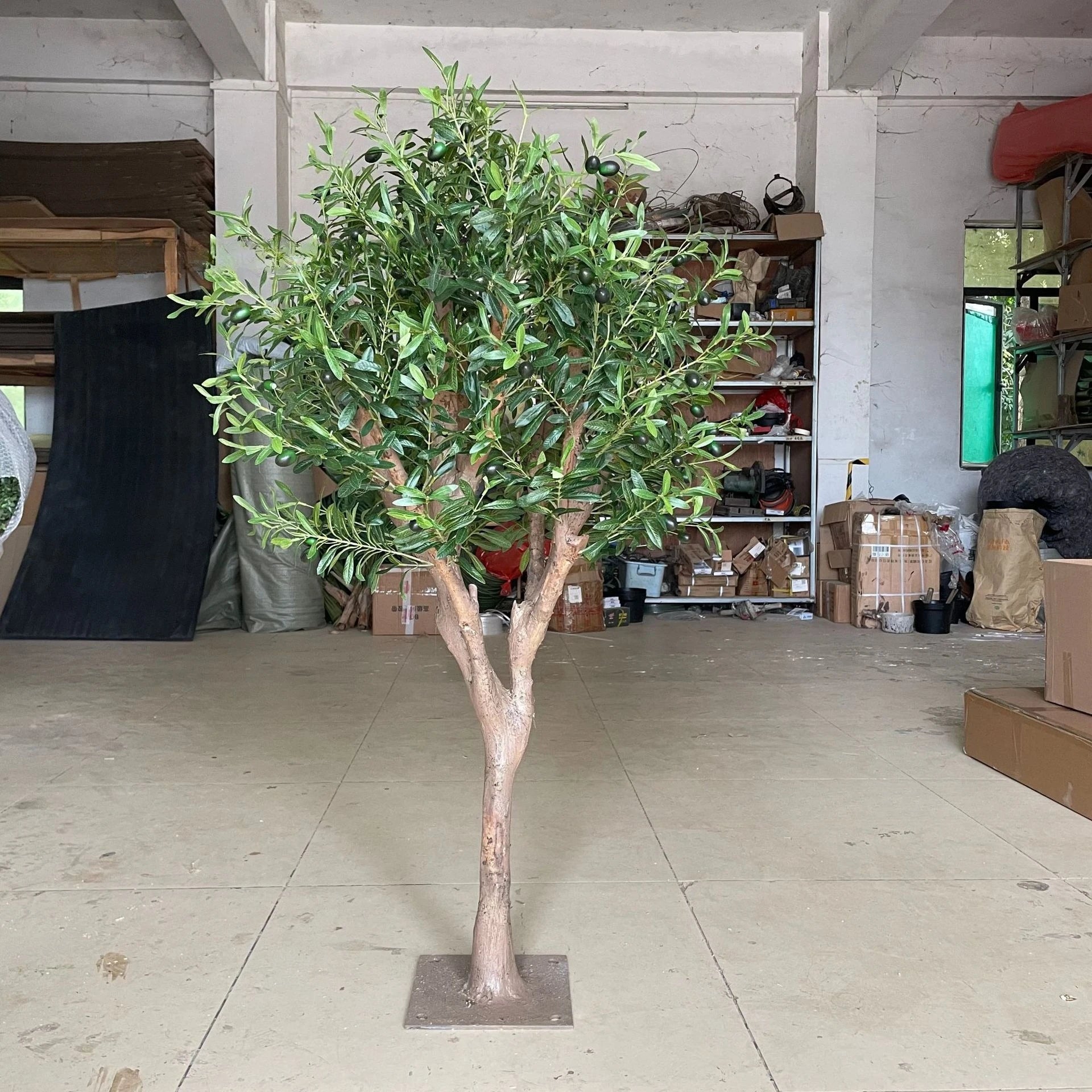 Simulated Olive Tree for Use Indoor or Outdoor; a Fake Green Plant used for decoration.